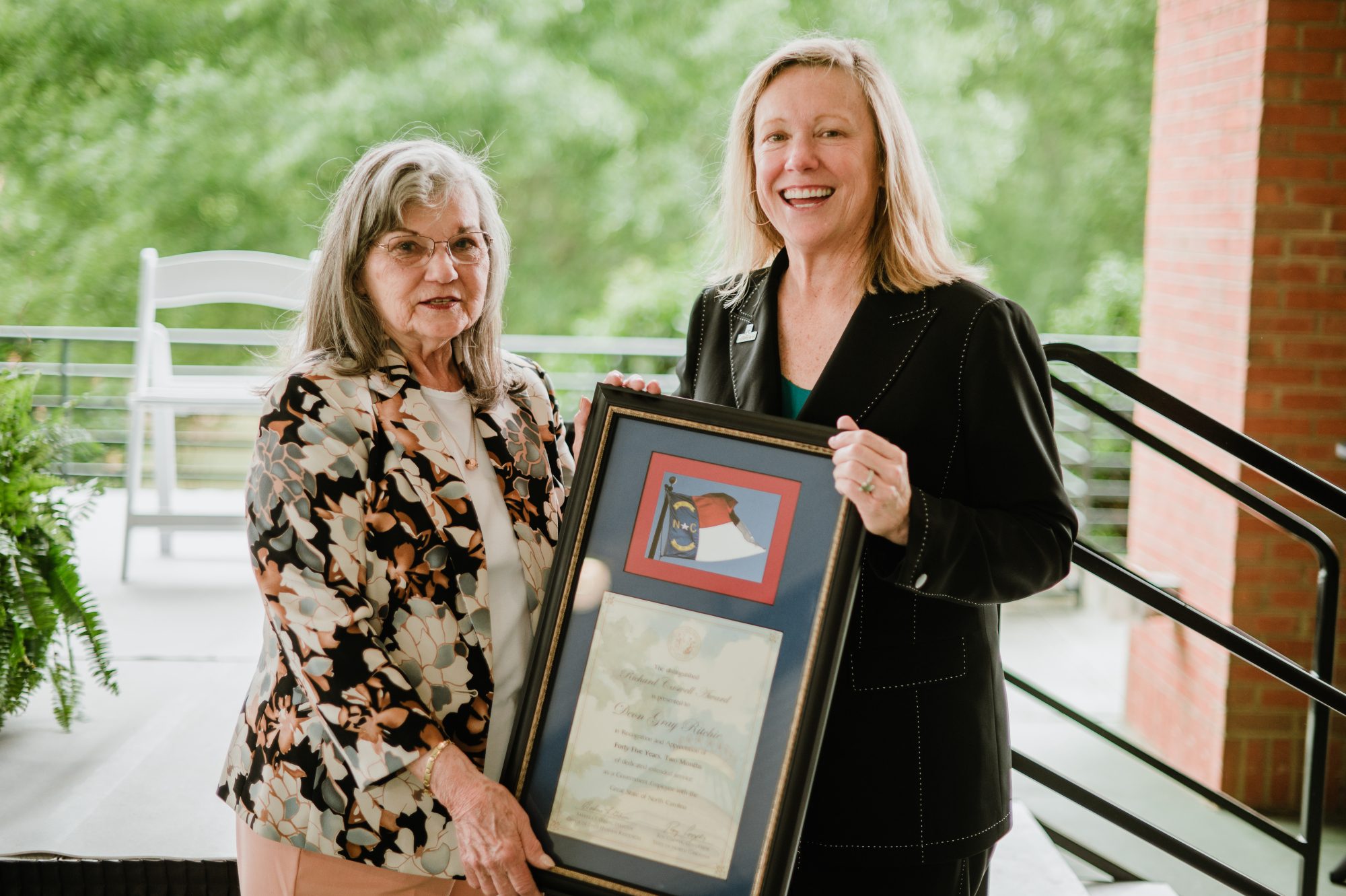 Left to right: Deon Richie (2022 award recipient) Chancellor Sharon L. Gaber)